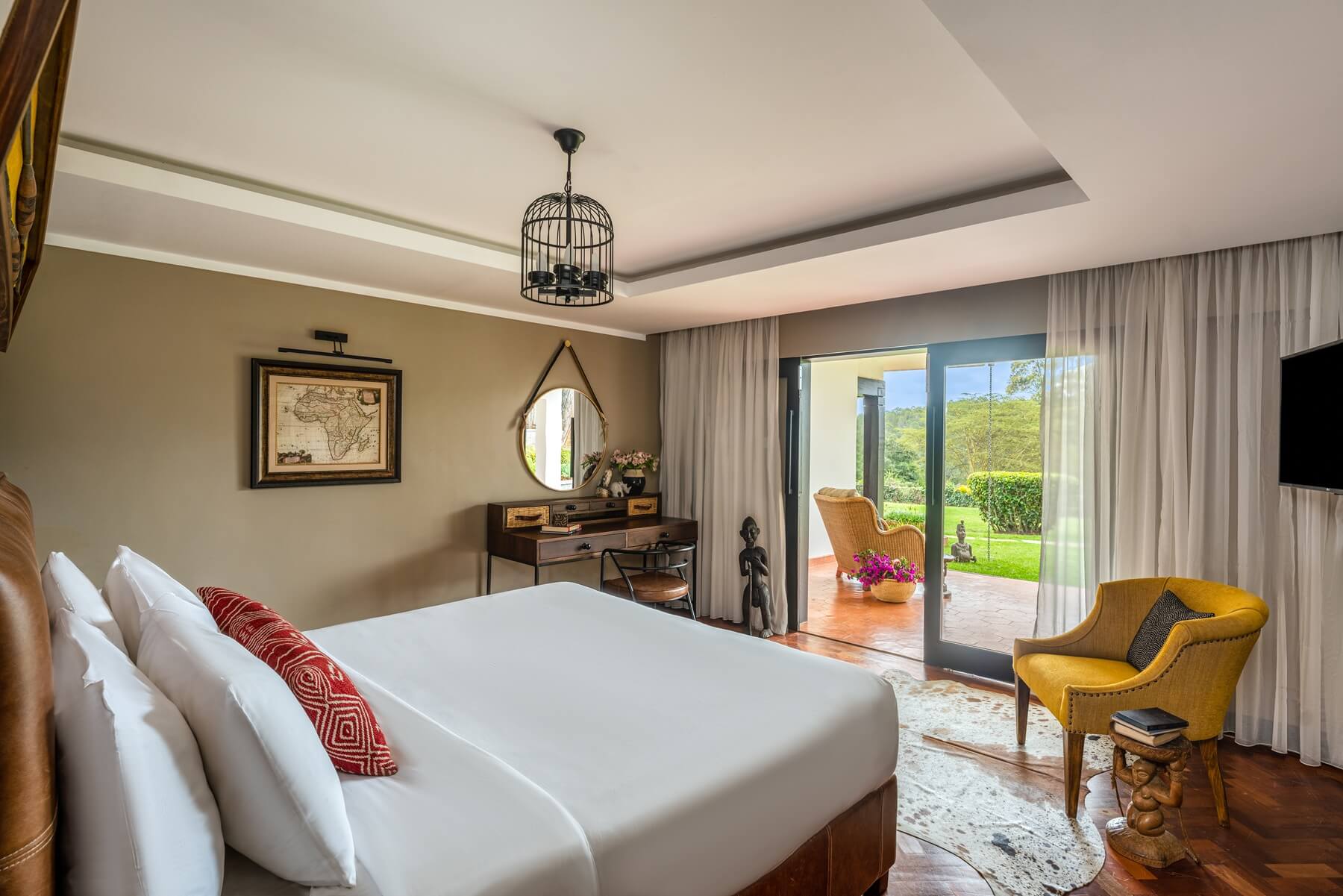 King size bed at Fairmont Mount Kenya Safari club