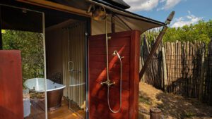 Oudoor shower at Sand River Masai Mara by Elewana 